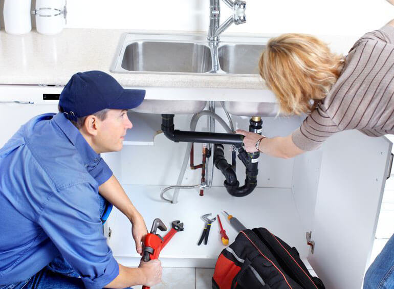 client showing plumber about the leakage issue - Wellington Plumbers