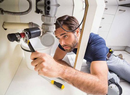 plumber fixing pipes image - Wellington Plumbers